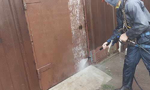 Мойка стен и заборов